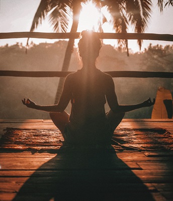 image of woman practicing slow breathing